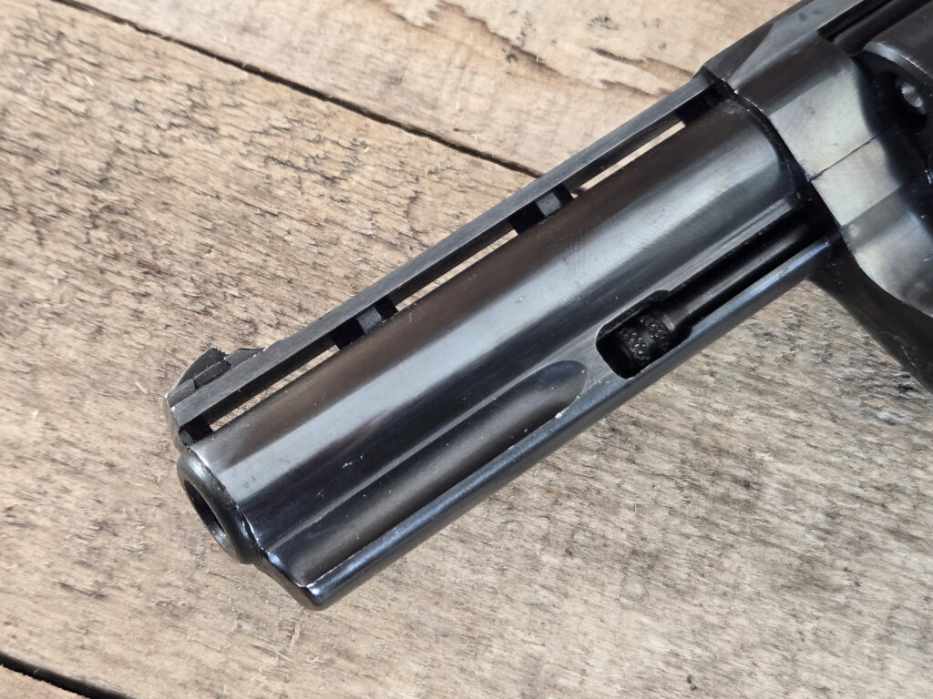 Recessed chambers and grooved top strap on Zastava M83